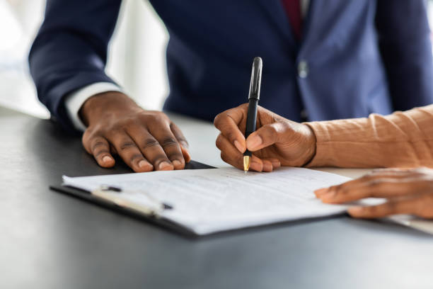istockphoto-1331285518-612x612 Contract Signing. Female Customer Sign Papers In Dealership Office, Unrecognizable African American Woman Client Buying New Car Or Purchasing Property, Closeup Shot, Cropped Image With Free Space